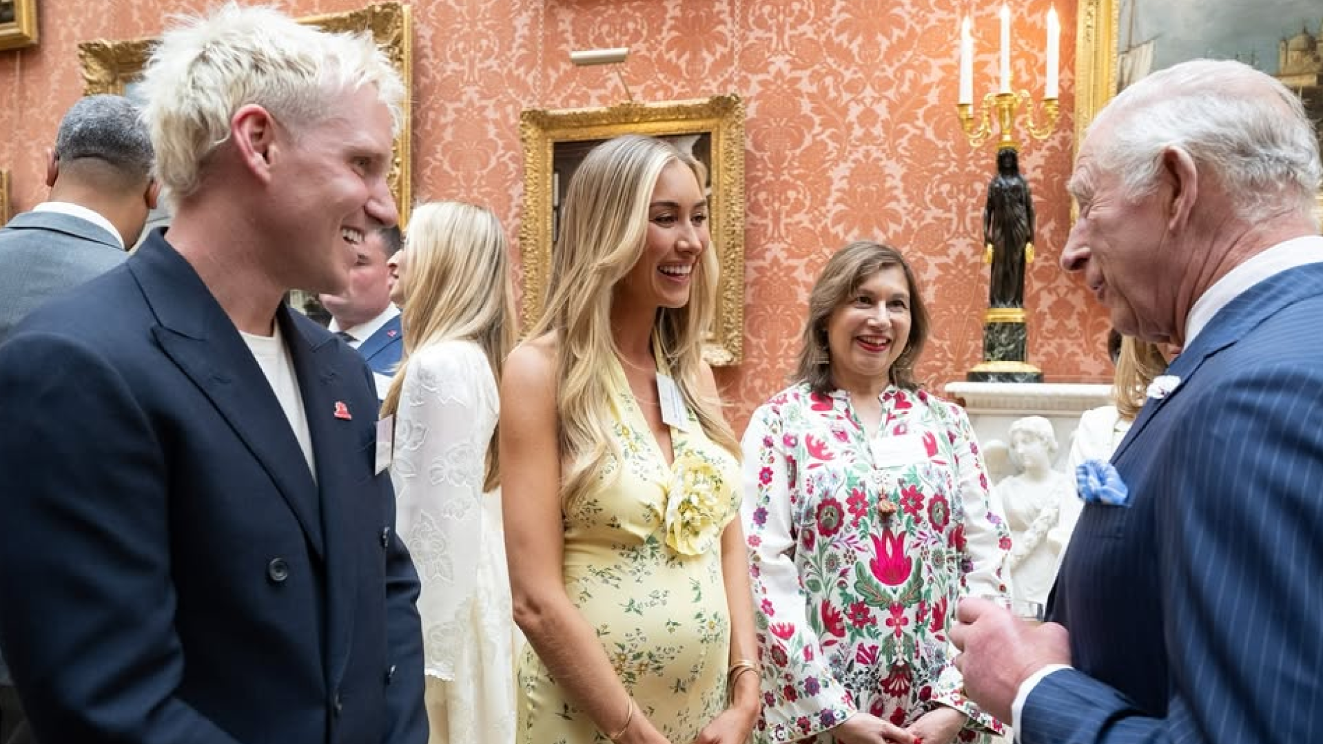 Jamie Laing and Sophie Habboo talking to King Charles at Buckingham Palace