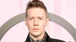 Ghost&rsquo;s Tobias Forge posing for a photograph in 2024 without his mask