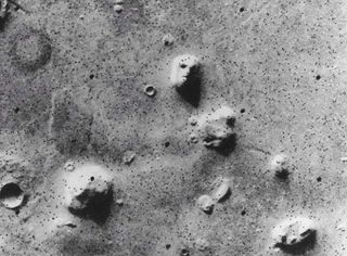 A rock from Mars which looks like a face taken by the Viking 1 spacecraft 