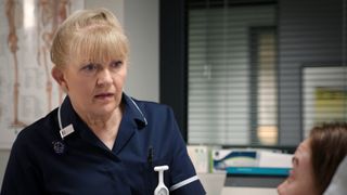 Unsung Holby hero! Duffy saves panicked pedestrian Carrie