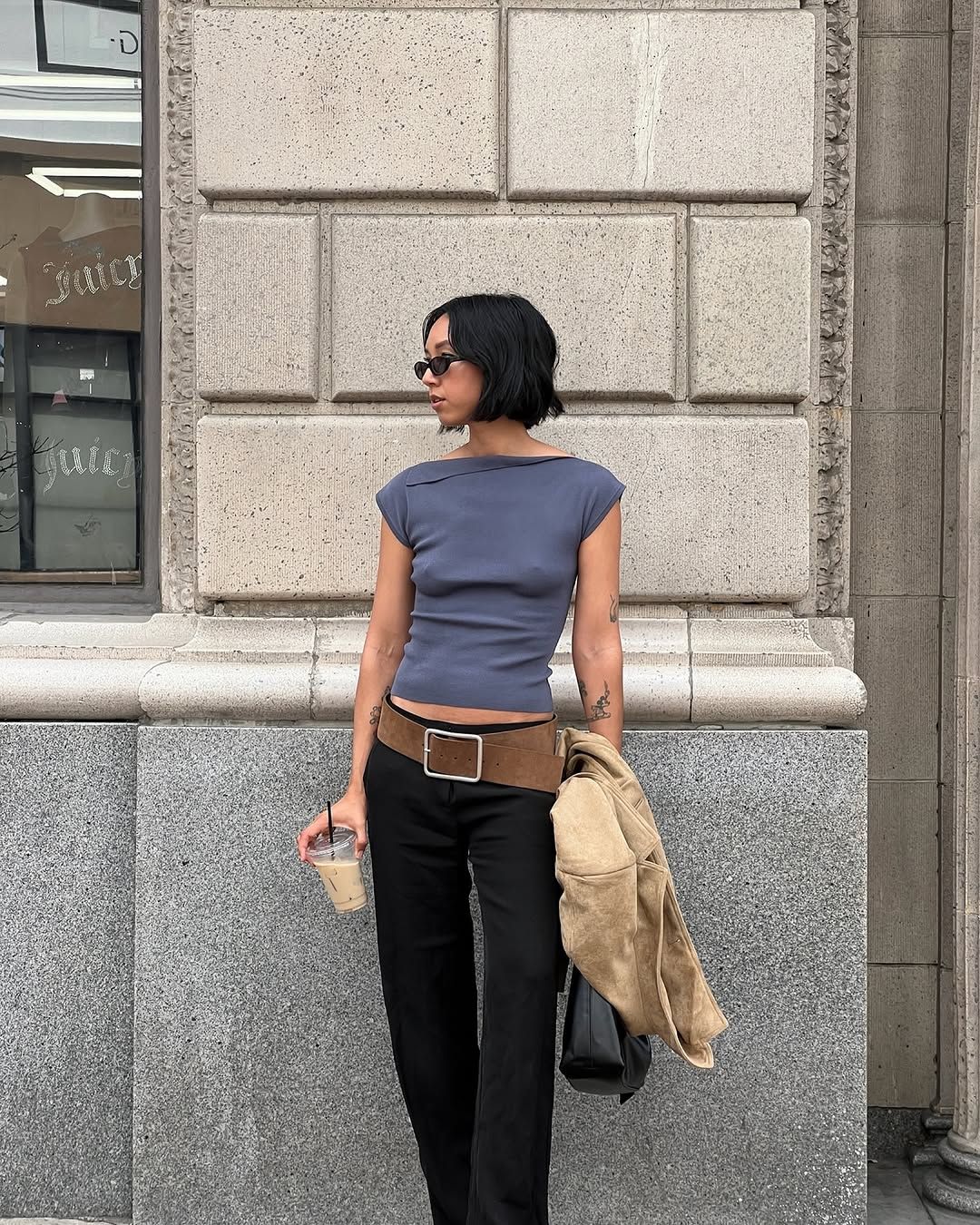 Woman wearing boatneck top.