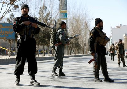 Afghan police officers on guard