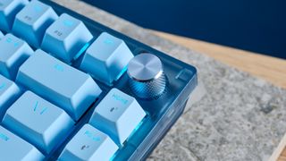 A glacier blue Corsair K65 Plus wireless mechanical keyboard for Mac