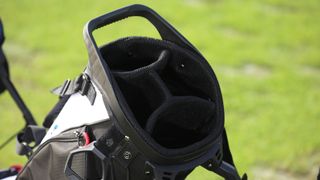 A detailed look at the four way divider on the Wilson Exo Lite stand bag