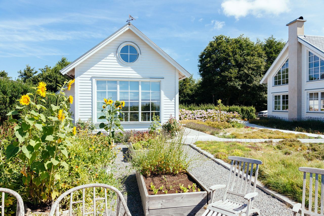 a home with a small vegetable garden