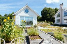 a home with a small vegetable garden