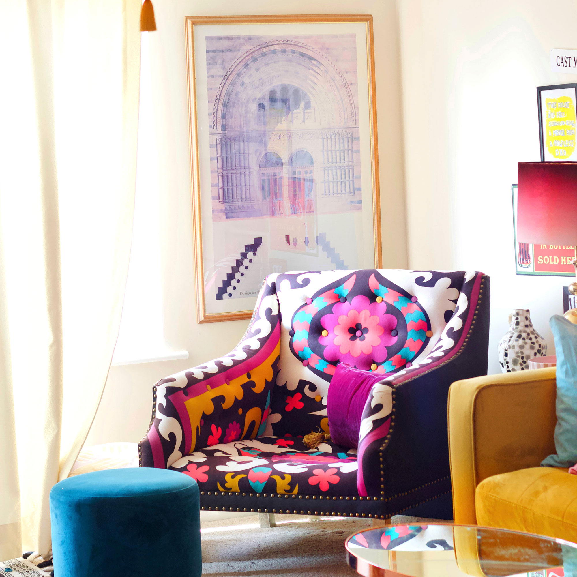 Colourful patterned upholstered chair in living room