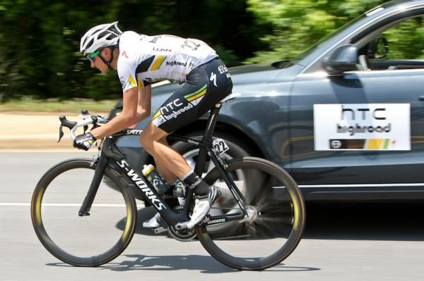 Danny Pate (HTC-Highroad) brings up some water bottles from the car.