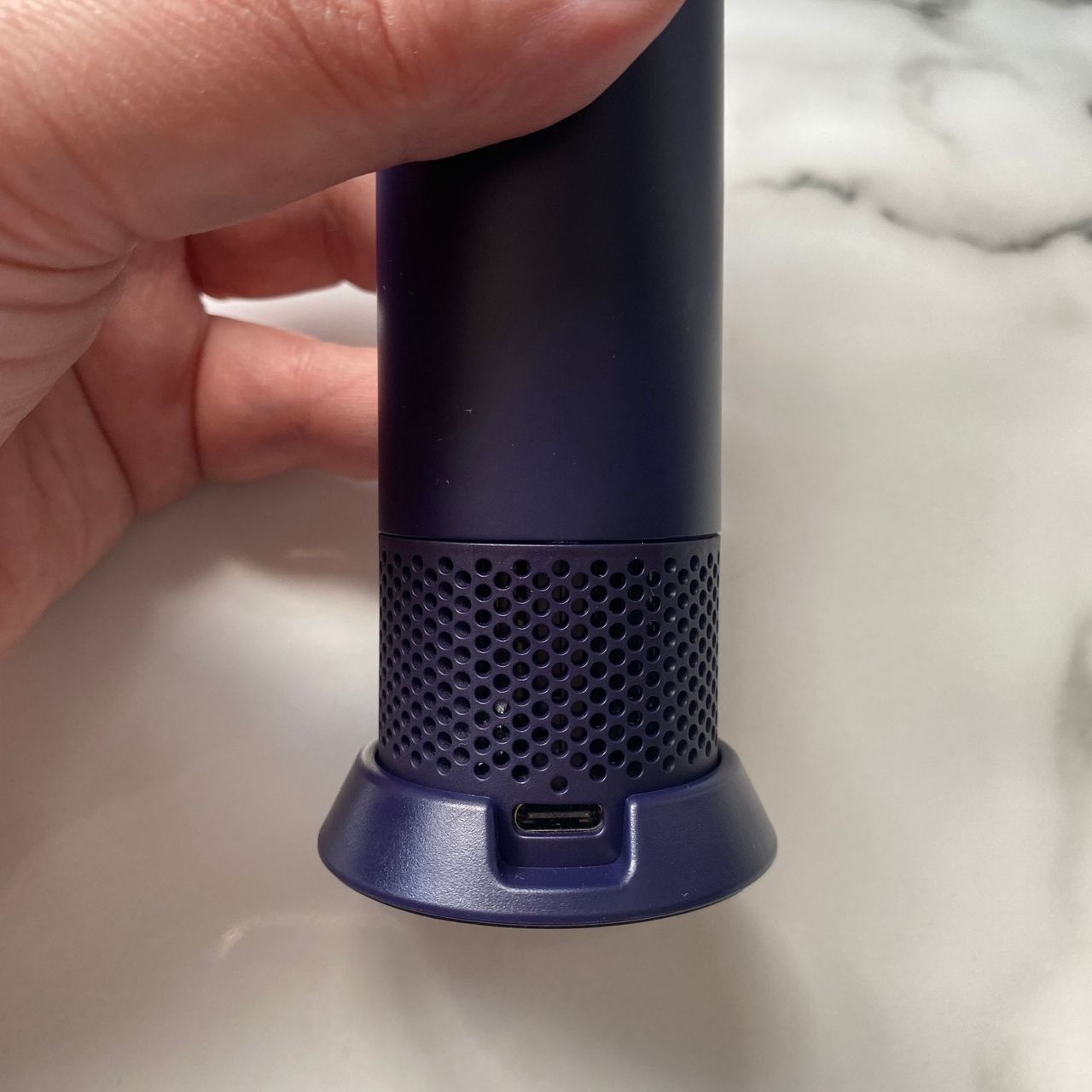 Close up of the Dyson HushJet Mini Cool fan charging point