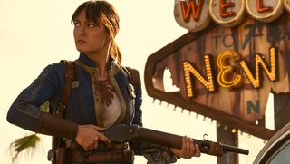 Lucy with a rifle in the Fallout TV series