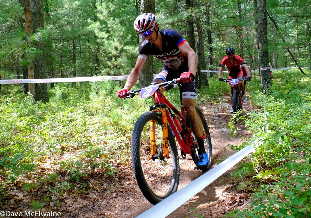 Stephen Ettinger (Ridebiker Alliance) leading the race on twisty singletrack during lap three