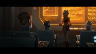 Still from Star Wars: The Clone Wars Season 3 Episode 6: The Academy. Here we see Ahsoka (orange skin, white face markings, white head tails with blue stripes) teaching a class to several Jedi-in-training. She is standing in front of a dark board that is filled with orange graphs and writing.