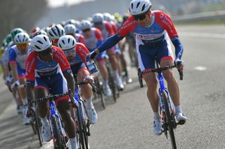 DE PANNE BELGIUM MARCH 24 Lorrenzo Manzin of France Edvald Boasson Hagen of Norway and Team Total Direct Energie during the 45th Oxyclean Brugge De Panne 2021 Men Classic a 2039km race from Brugge to De Panne Feeding Bottle OxycleanClassic on March 24 2021 in De Panne Belgium Photo by Luc ClaessenGetty Images