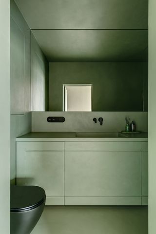 minimalist green bathroom