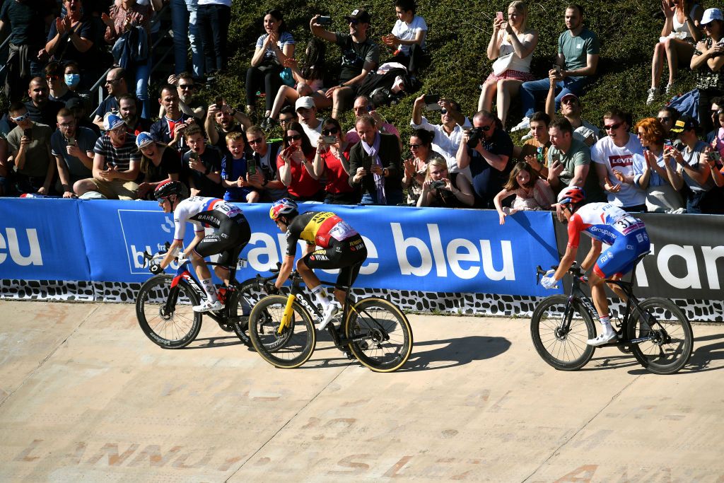 ROUBAIX FRANCE APRIL 17 A general view of Matej Mohoric of Slovenia and Team Bahrain Victorious Wout Van Aert of Belgium and Team Jumbo Visma and Stefan Kng of Switzerland and Team Groupama FDJ sprints in last lap in the Roubaix Velodrome Vlodrome Andr Ptrieux during the 119th ParisRoubaix 2022 Mens Elite a 2572km one day race from Compigne to Roubaix ParisRoubaix WorldTour on April 17 2022 in Roubaix France Photo by Luc ClaessenGetty Images