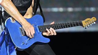 Phil Collen of Def Leppard performs onstage during the "Summer Stadium" tour at Truist Park on July 13, 2024 in Atlanta, Georgia