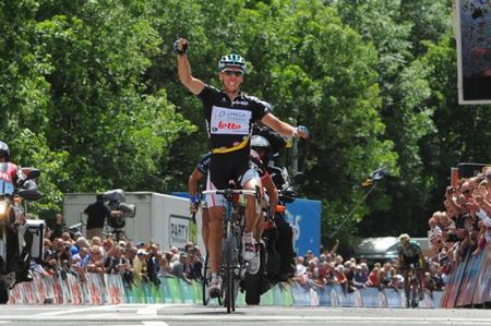 Race leader Philippe Gilbert (Omega Pharma-Lotto) celebrates his victory in the penultimate stage.