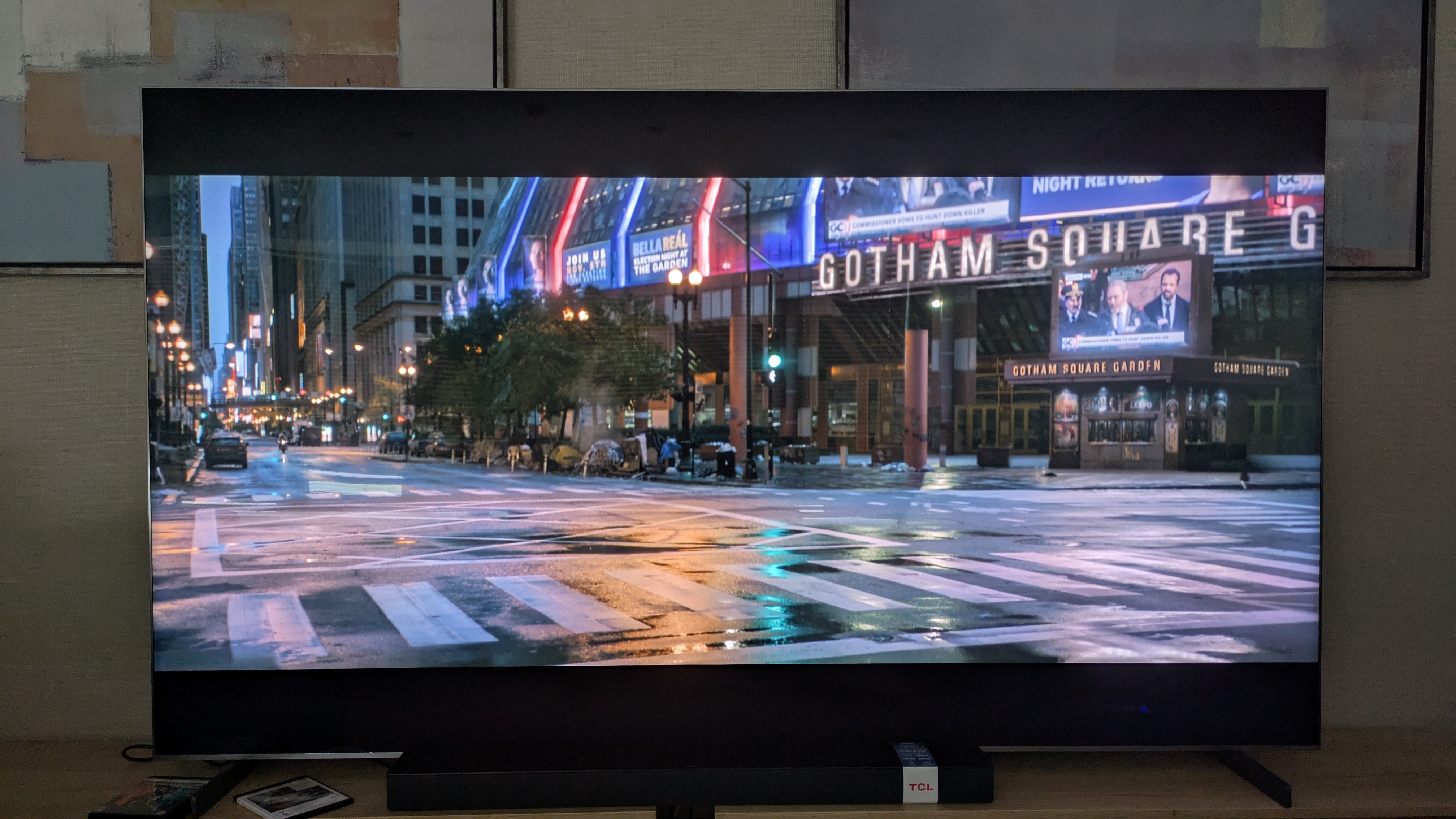 TCL 98-inch C8K with shot of Gotham from The Batman on screen