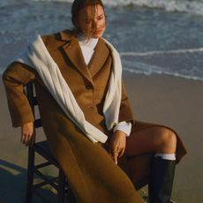 woman in coat and scarf