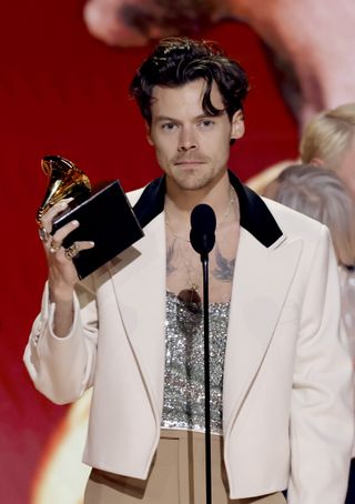 Harry Styles accepts the Album Of The Year award for “Harry's House” onstage during the 65th GRAMMY Awards at Crypto.com Arena on February 05, 2023 in Los Angeles, California