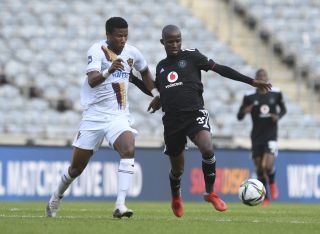 Terrence Dzvukamanja challenged by Sibusiso Mthethwa