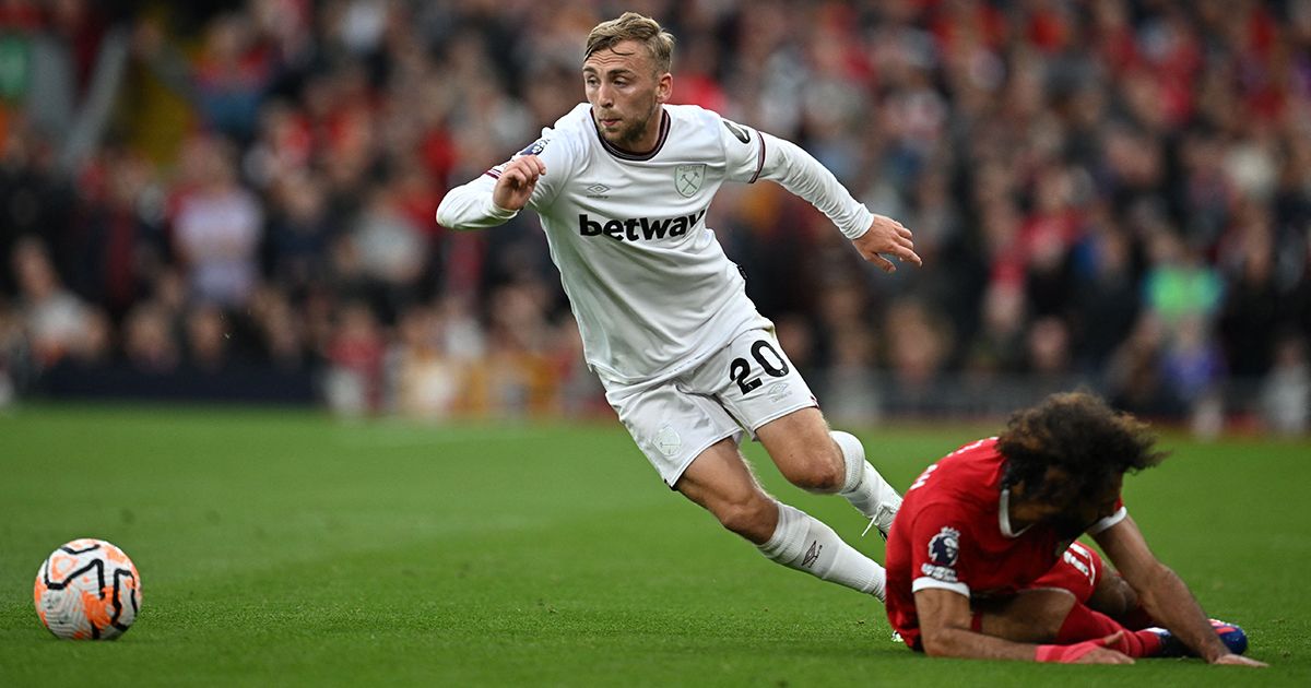 Liverpool star Mohamed Salah attempts to tackle Jarrod Bowen of West Ham United