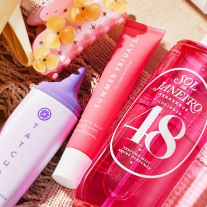 Summer beauty products from Space NK with pink hair clip