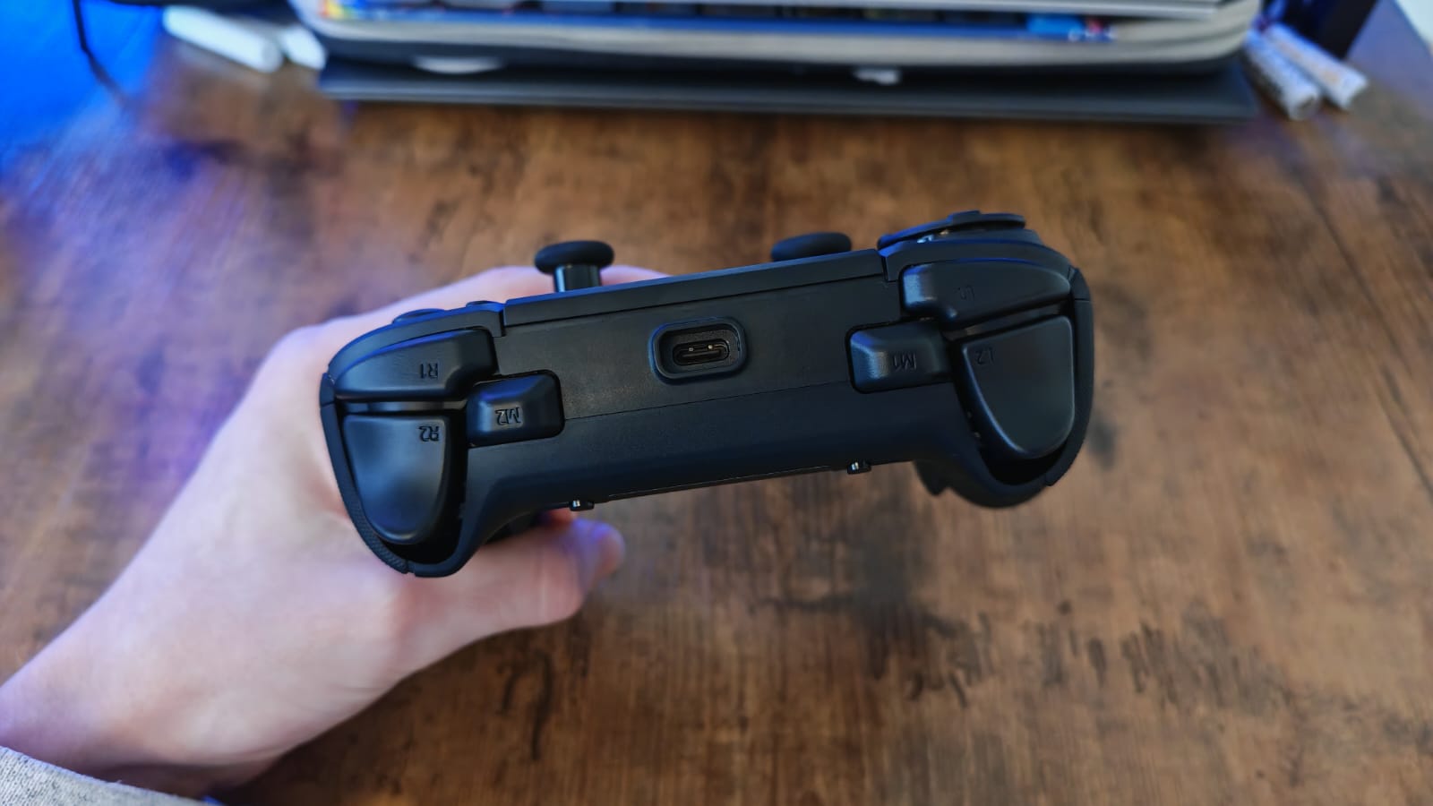 The top of the Razer Raiju V3 Pro showing its extra bumpers
