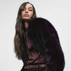 Woman wearing an outfit from Reiss