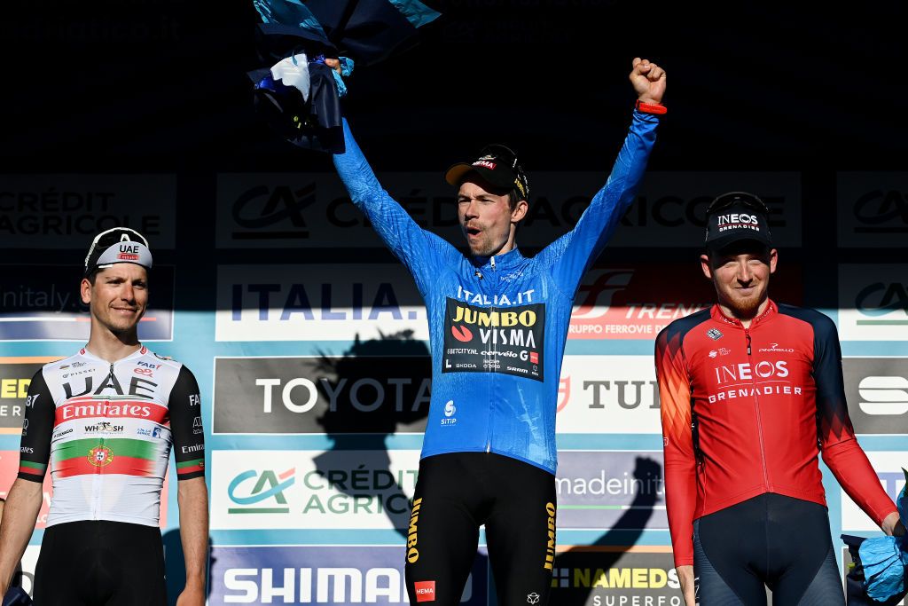 SAN BENEDETTO DEL TRONTO ITALY MARCH 12 LR Joao Almeida of Portugal and UAE Team Emirates on second place race winner Primoz Roglic of Slovenia and Team Jumbo Visma and Tao Geoghegan Hart of The United Kingdom and Team INEOS Grenadiers on third place pose on the podium ceremony after the 58th TirrenoAdriatico 2023 Stage 7 a 154km stage from San Benedetto del Tronto to San Benedetto del Tronto UCIWT TirrenoAdriatico on March 12 2023 in San Benedetto del Tronto Italy Photo by Tim de WaeleGetty Images