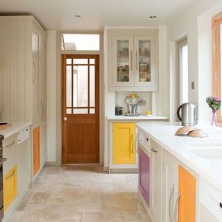 kitchen with white worktop and white walls