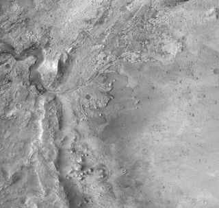 The USGS Astrogeology Science Center generated this mosaic of Mars’ Jezero Crater using Context Camera images from NASA’s Mars Reconnaissance Orbiter . This product is onboard the Mars 2020 rover Perseverance and will be the "truth" dataset that the mission’s Terrain-Relative Navigation system will use to orient itself relative to the surface during entry, descent and landing on Feb. 18, 2021.