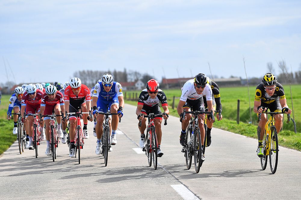 Philippe Gilbert leads an echeclon during stage 2 at Three days of De Panne