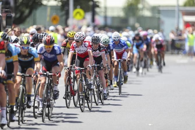 The peloton strung out