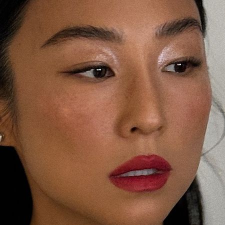 A close up of Greta Lee