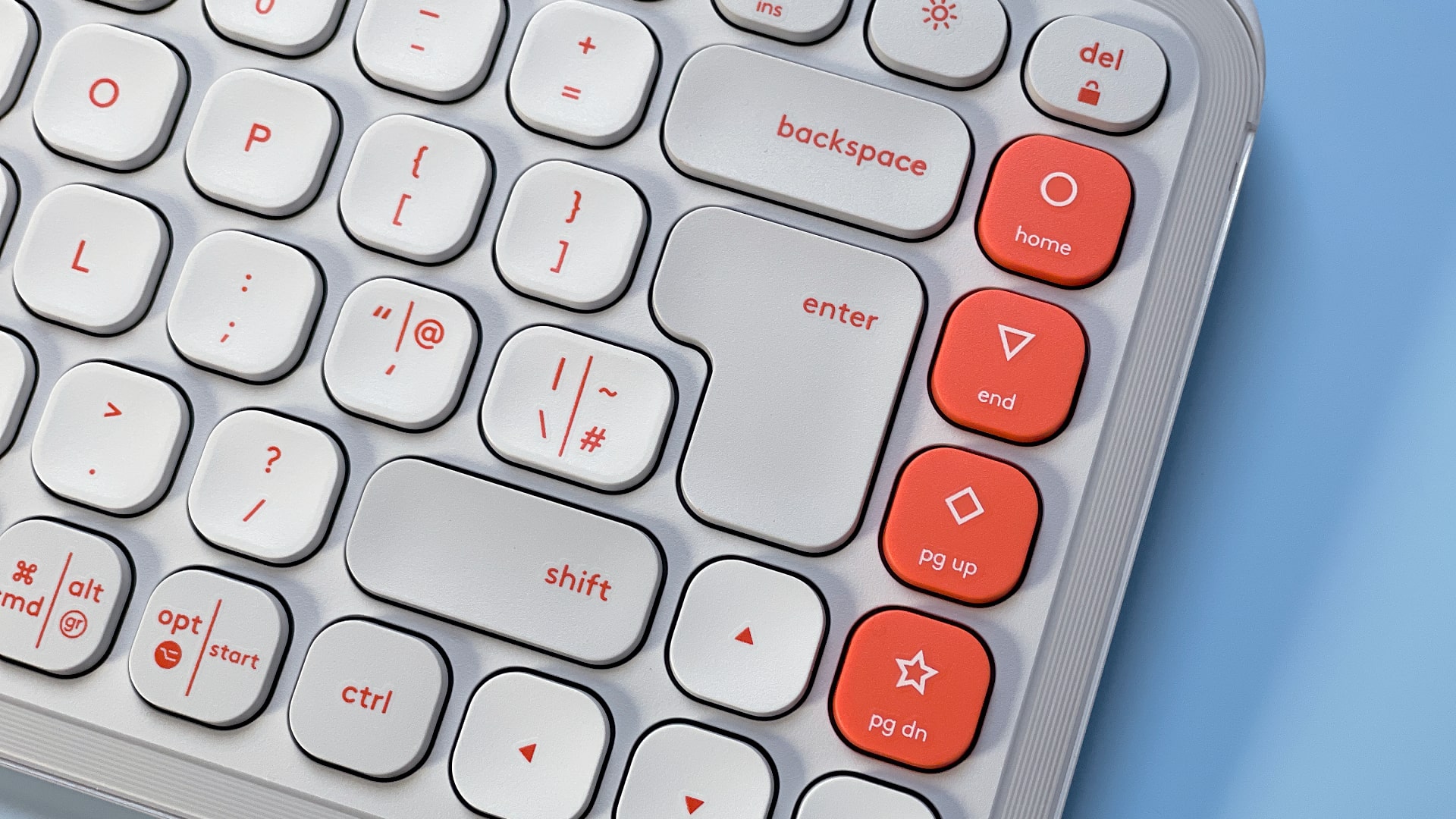 The Logitech POP Icon Keys keyboard against a blue background.