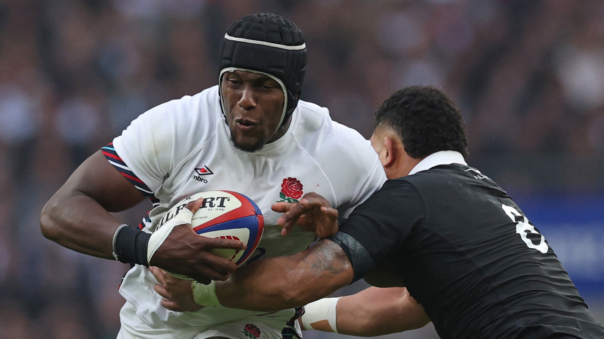 England's lock Maro Itoje (L) is tackled by New Zealand's number 8 Ardie Savea (R) during the Autumn Nations Series International rugby union test match between England and New Zealand at the Allianz Stadium, Twickenham in south-west London, on November 2, 2024. (Photo by Adrian Dennis / AFP)
