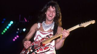 Eddie Van Halen (1955-2020) plays his custom Frankenstrat guitar at Cobo Arena during Van Halen's "Hide Your Sheep Tour" on August 13, 1982, in Detroit, Michigan