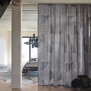 curtain with grey coloured and pot