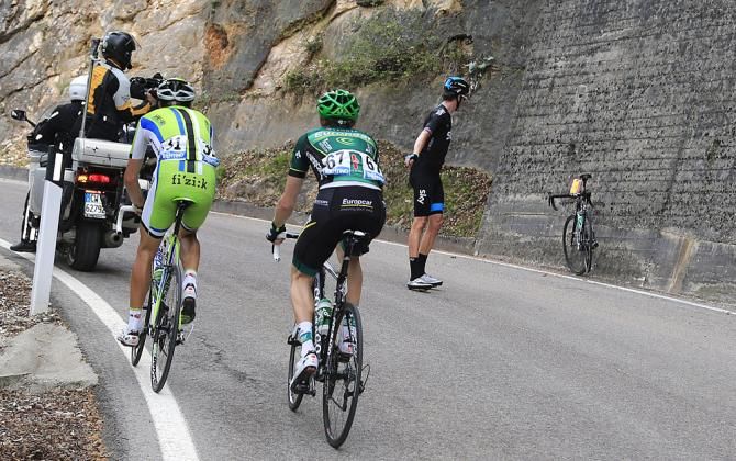 Bradley Wiggins (Sky) tosses his bike in frustration
