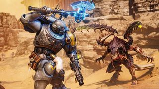 An Ultramarine prepares to whack a Tyranid with a power axes in Space Marine 2