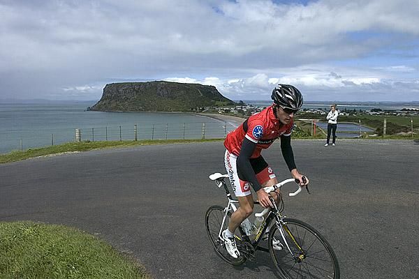 Daniel Seagar (Search 2 Retain) from New Zealand climbs out of Stanley with the famous landmark of the 'Nut' in the background.