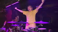 Zak Starkey on stage in 2023