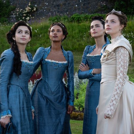 Josie Totah, Alisha Boe, Aubri Ibrag and Kristine Fr&oslash;set wearing guilded age dresses in a garden in a still from the buccaneers season 2