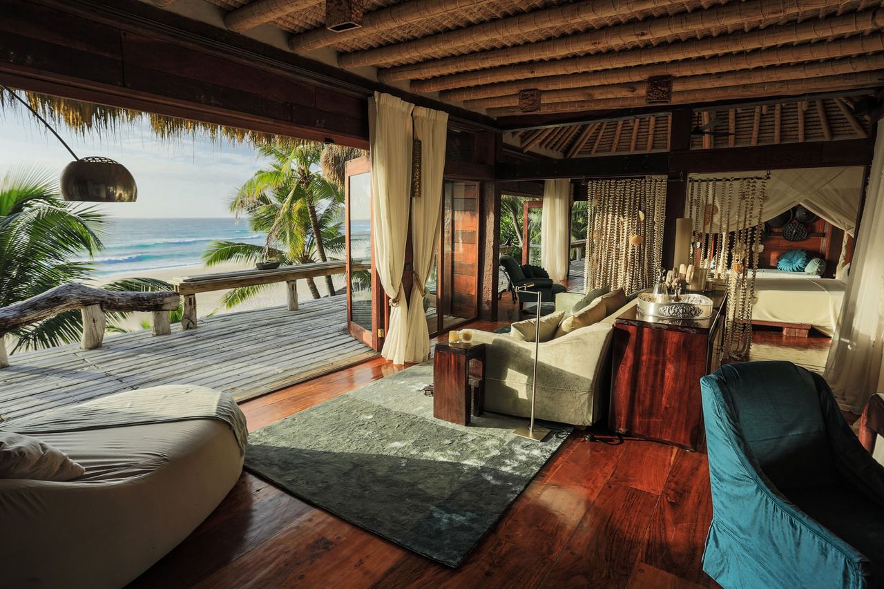 Dark wood floor open windows to wooden terrace