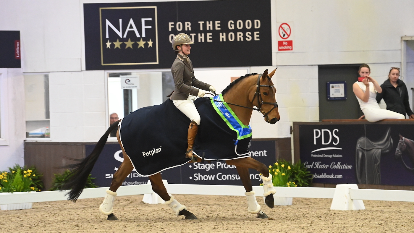 Gabriella Kozersky and Hollywood Semilly win the under 21 bronze elementary at the Petplan Area Festival Championships 2024