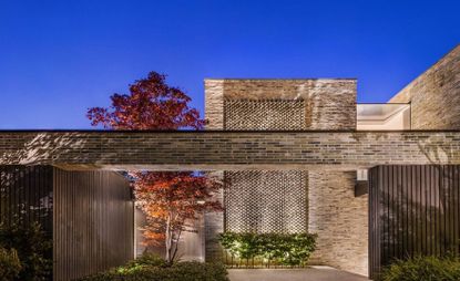 Entrance courtyard, new house by Gregory Phillips Architects