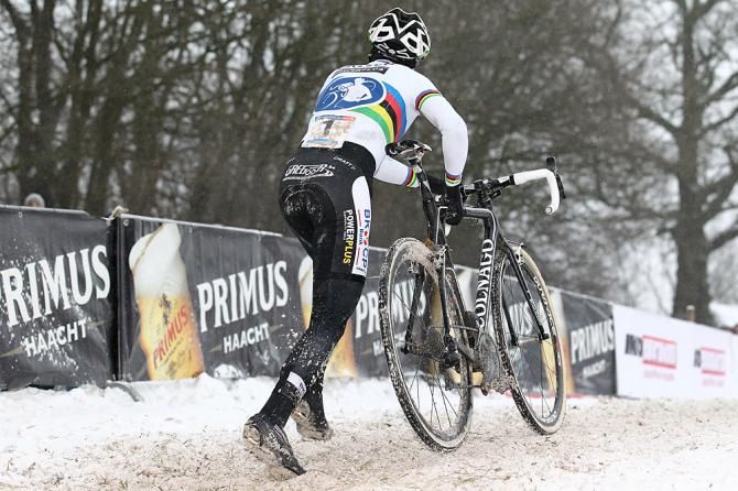 Niels Albert runs up the icy slope