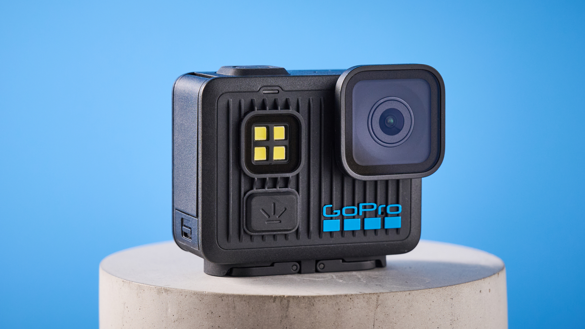 The GoPro LIT Hero against a blue background