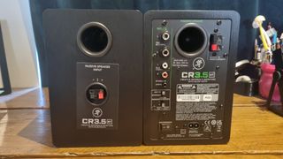 The rear of the Mackie CR3.5 desktop speakers, showing the various connections and the rear bass ports